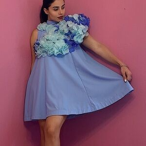 Charming Light Blue Flared Dress with Handcrafted Floral Embellishments.